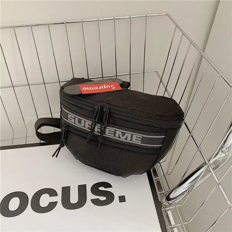 Chanel Backpacks Nylon Backpack with Interlocking CC Logo — 25