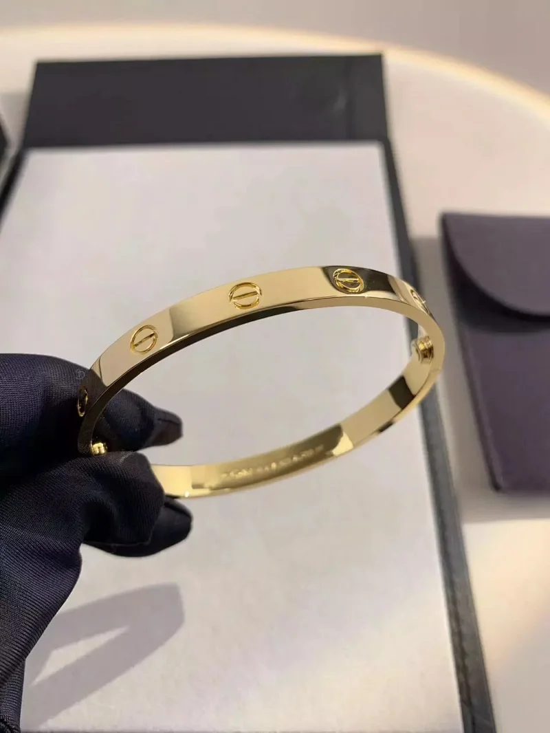 Cartier Jewelry LOVE bracelet with diamond-set screw motifs — Golden