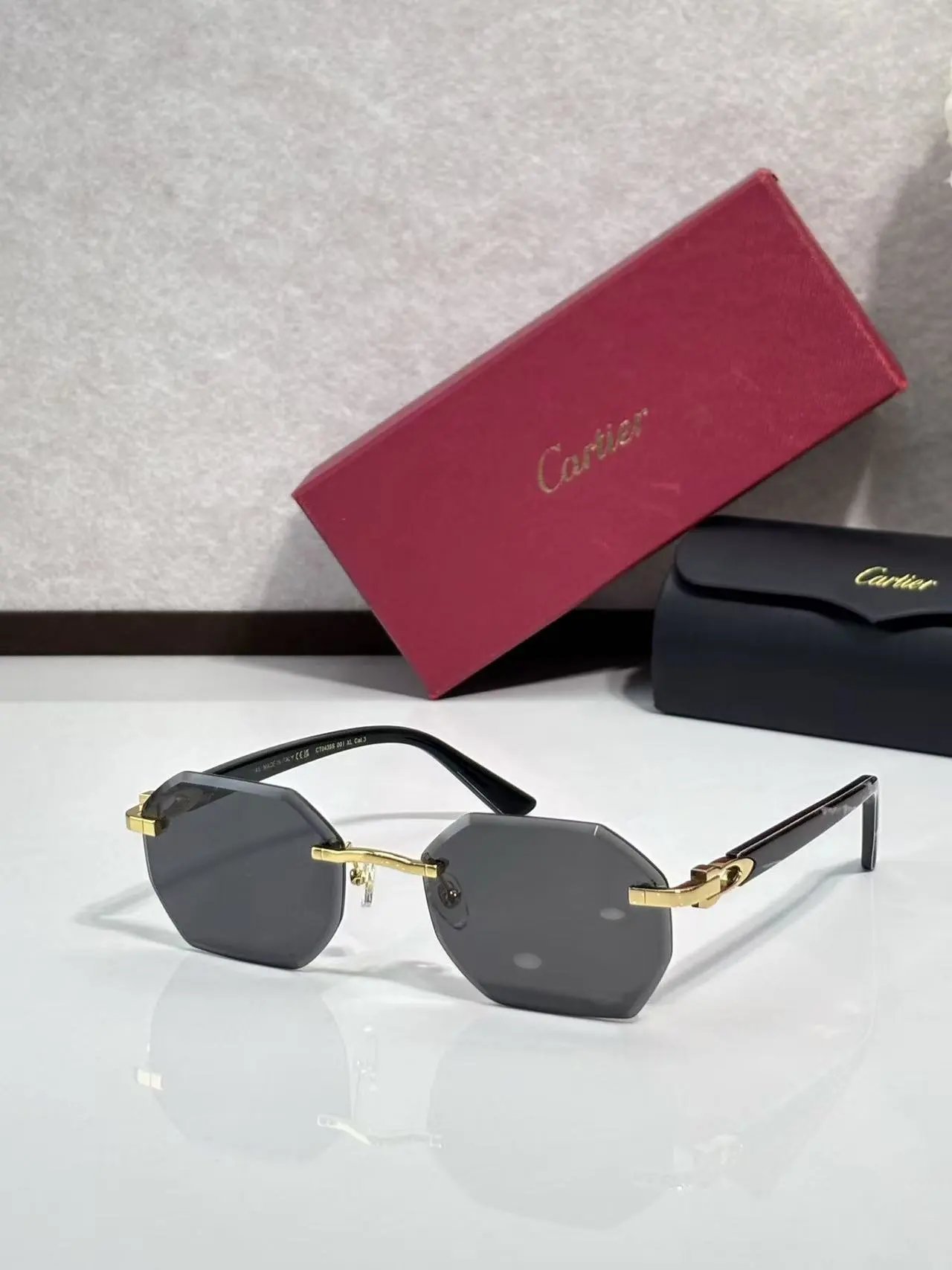Cartier Eyewear 8033 rimless rectangular sunglasses with gold-tone hardware — 38