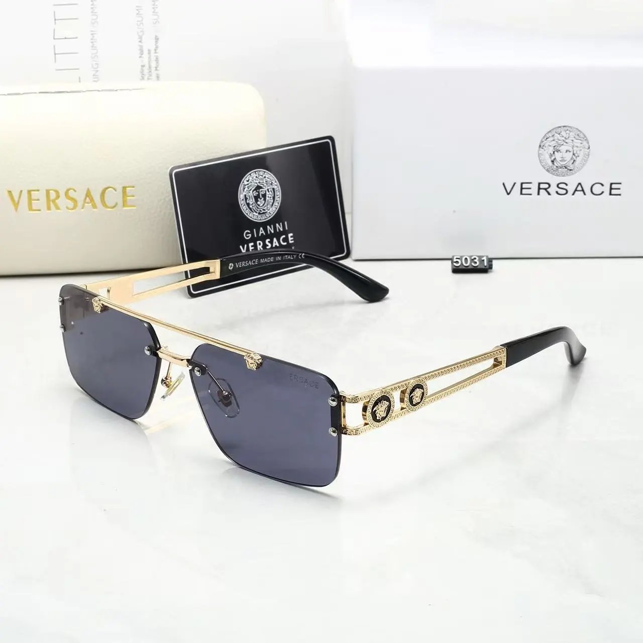 Versace Eyewear YX3207 geometric sunglasses with Medusa emblems — 25