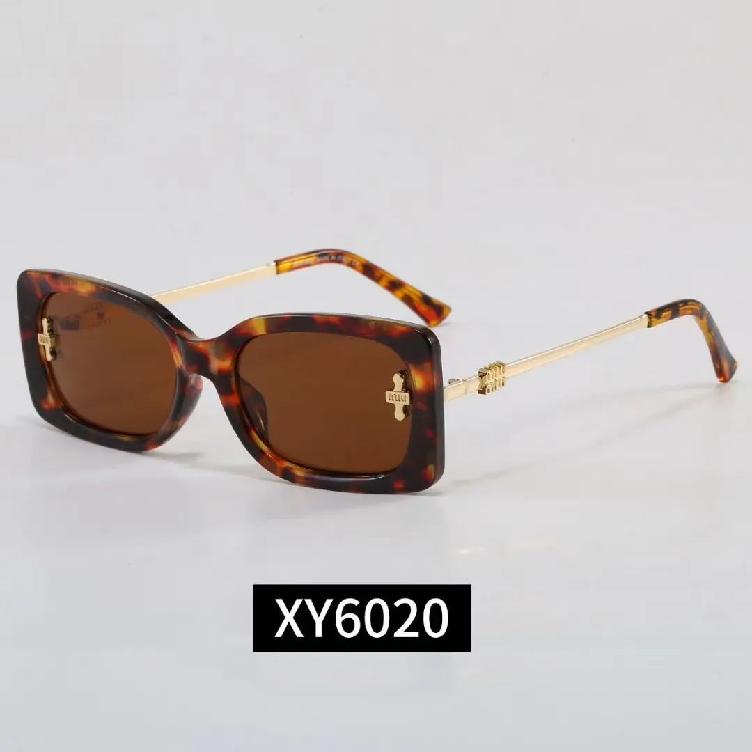 Miu Eyewear 2778 oversized cat-eye sunglasses — 40