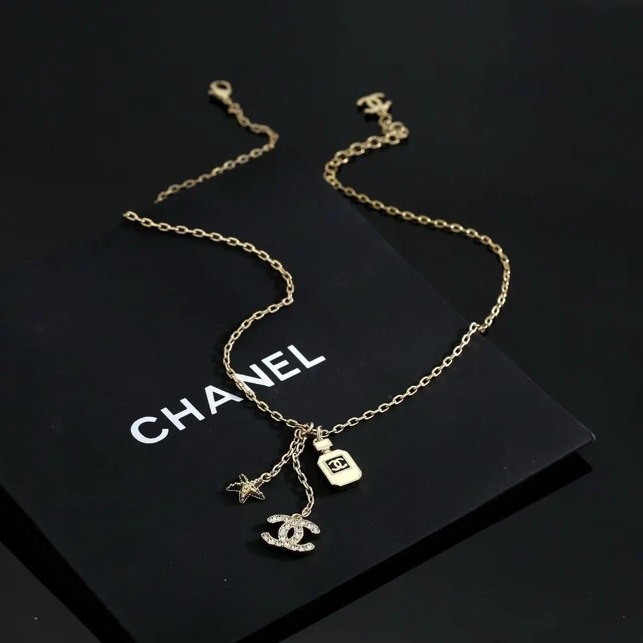 Chanel Jewelry Logo Pendant Necklace — 9