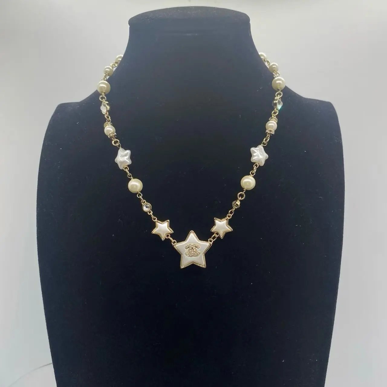 Chanel Jewelry Logo Pendant Necklace — 31