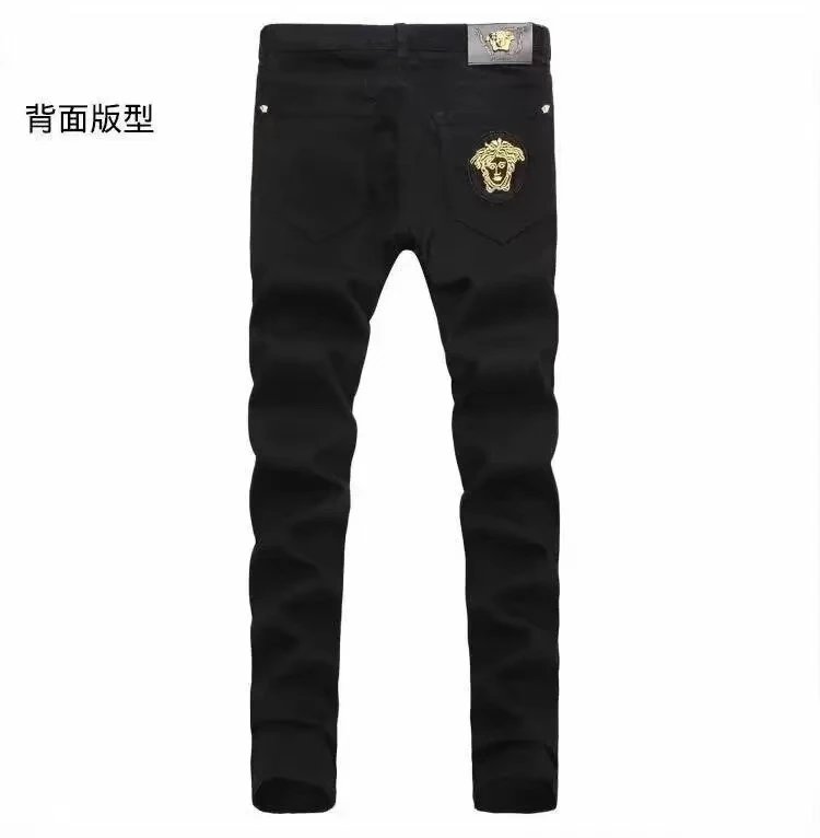 Saint Laurent Jeans Logo-Embellished — 12