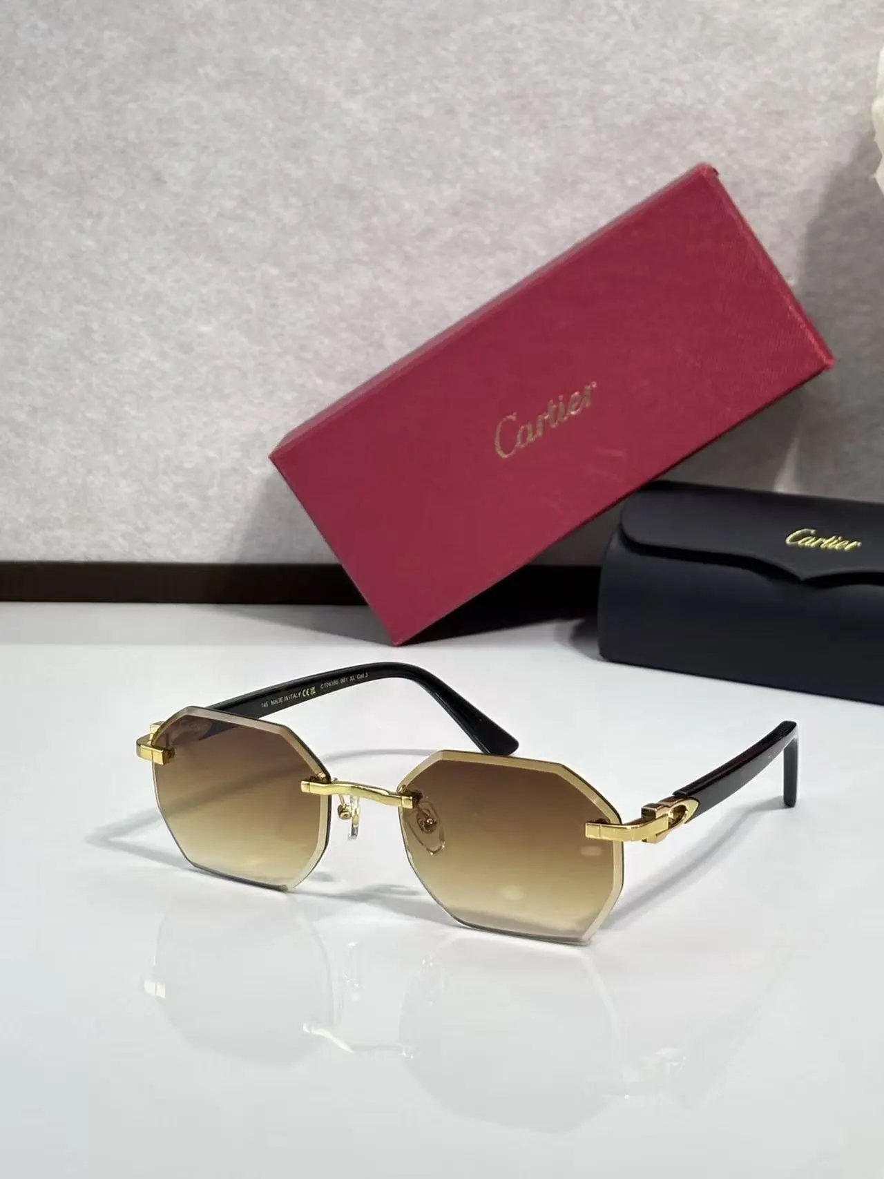 Cartier Eyewear 8033 rimless rectangular sunglasses with gold-tone hardware — 39