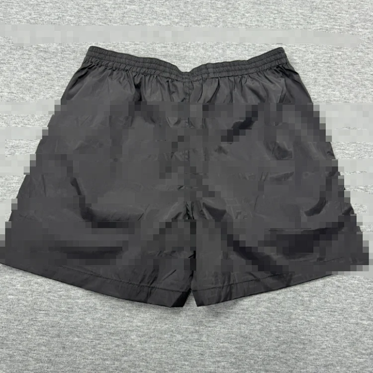 Dark patterned letter cropped pants (visible when exposed to water)