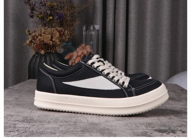 Low-top black small triangle (canvas)