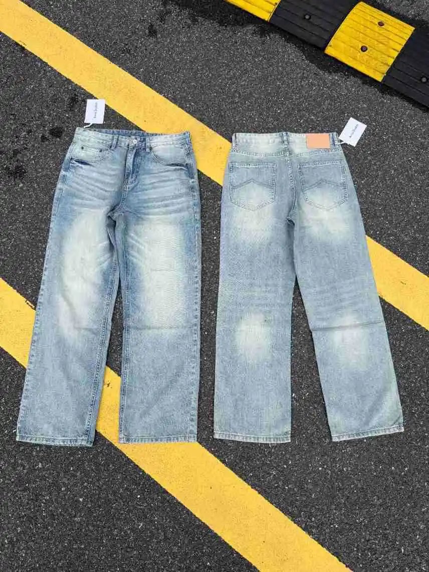 Design Wide-Leg Distressed Light Wash Jeans - 1