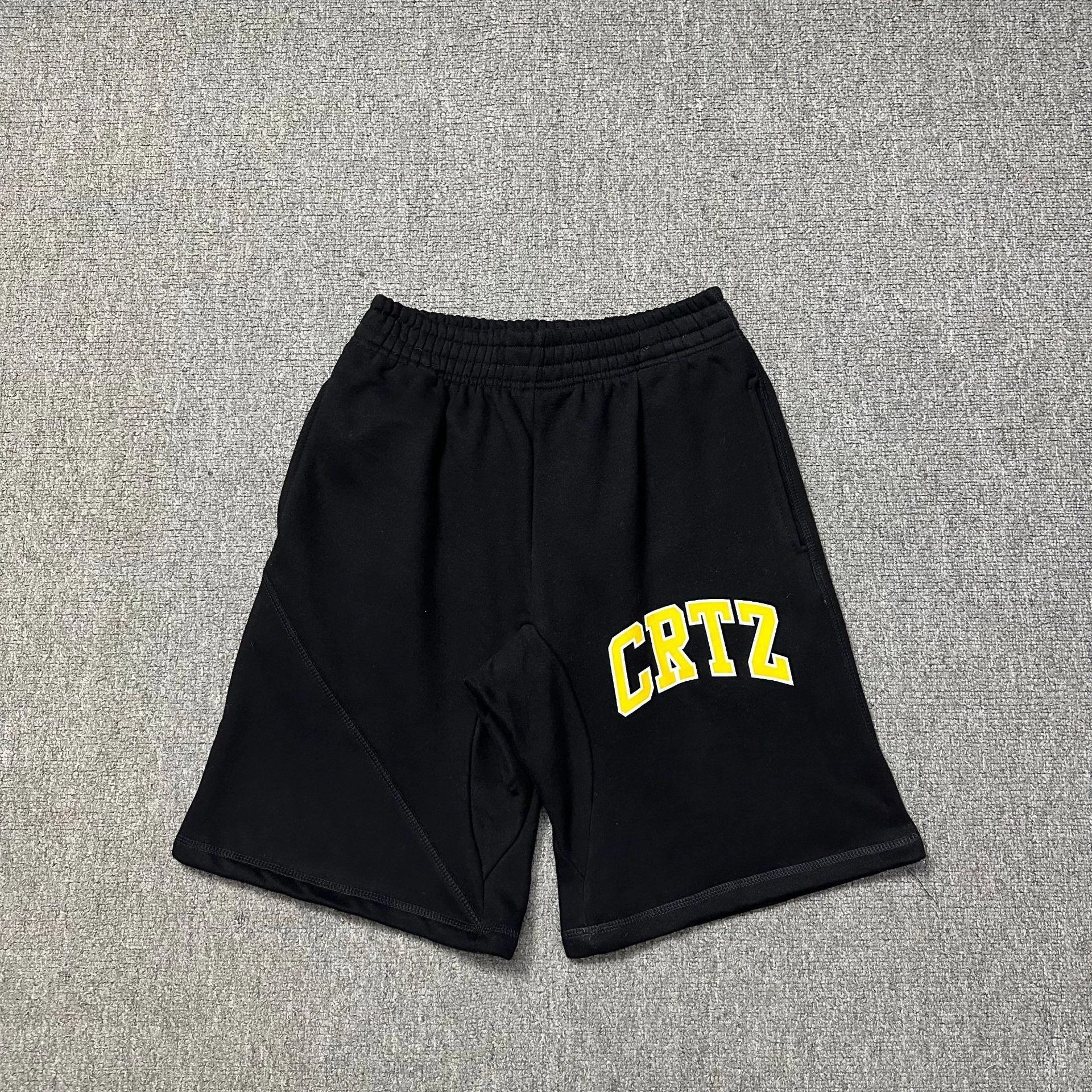 823 black and yellow shorts