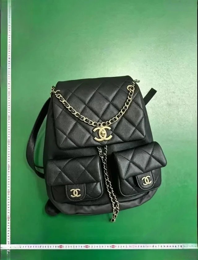 MCM Backpacks Visetos logo-print studded backpack image 3