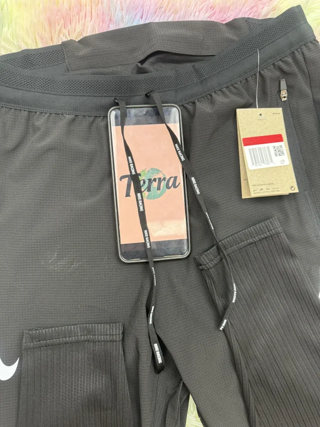 Nike Trousers AeroSwift tapered running with zip pockets product detail image 6