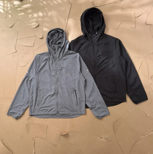 The North Face Grey and Black Hooded Windbreaker Jackets