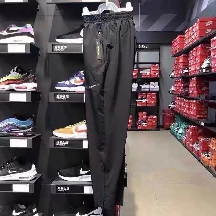 Nike Men's Black Woven Jogger Pants with Zip Pockets