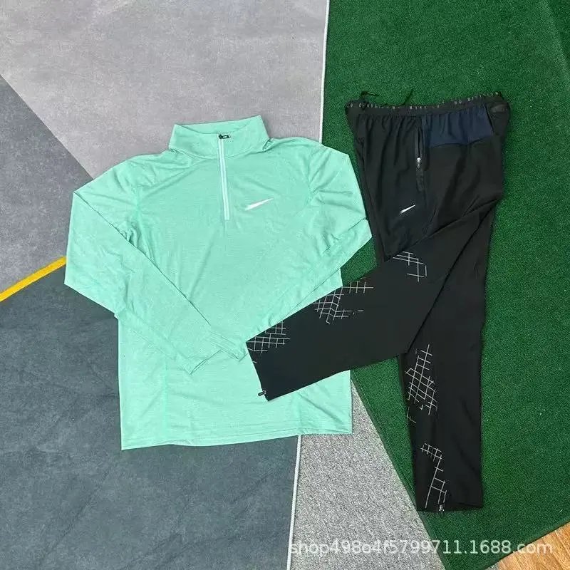 Nike Jackets Running Division hooded windbreaker jacket — 06