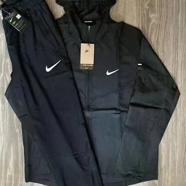 Nike Jackets Running Division hooded windbreaker jacket image 7