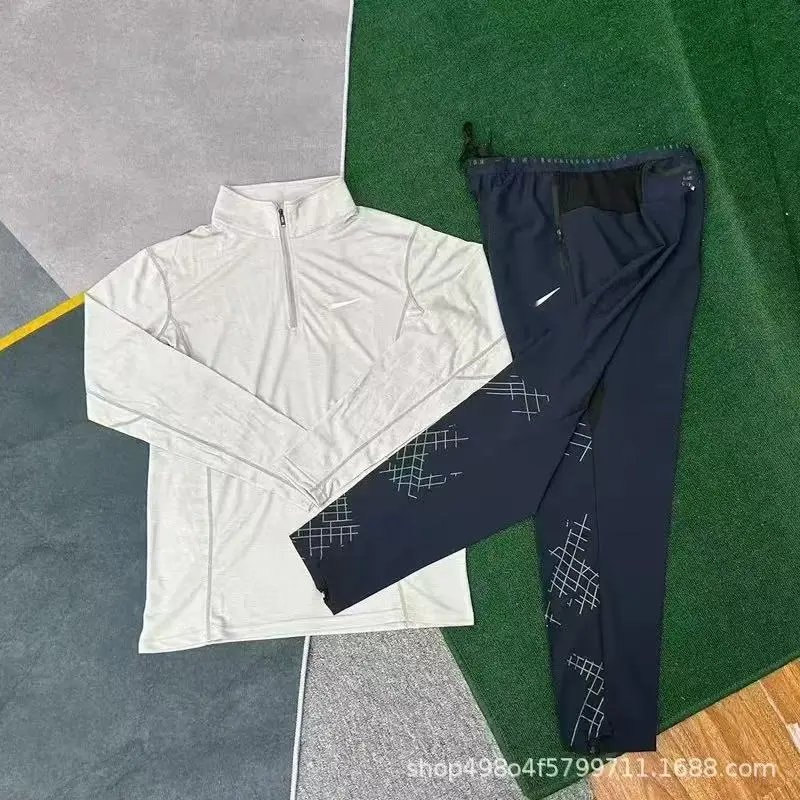 Nike Jackets Running Division hooded windbreaker jacket — 01