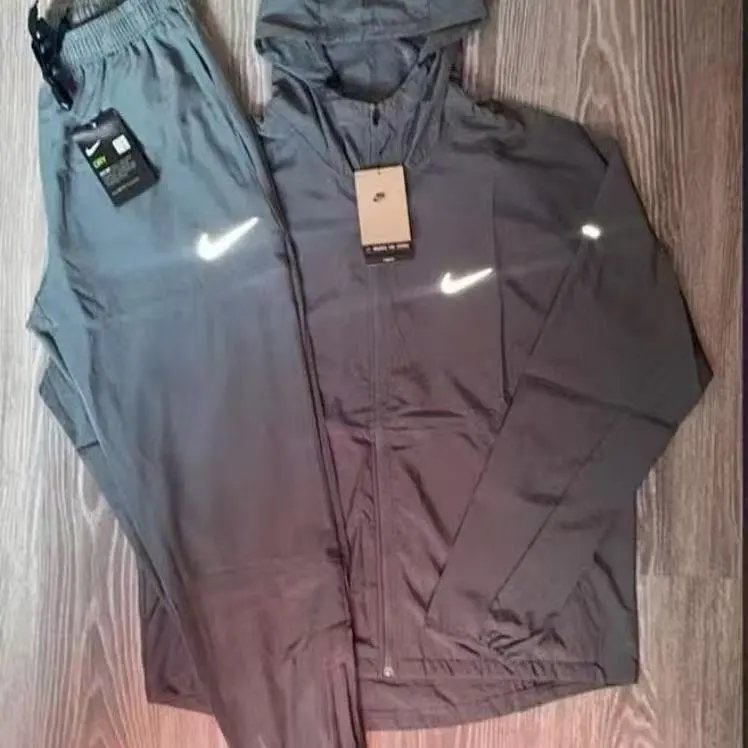 Nike Jackets Running Division hooded windbreaker jacket image 8