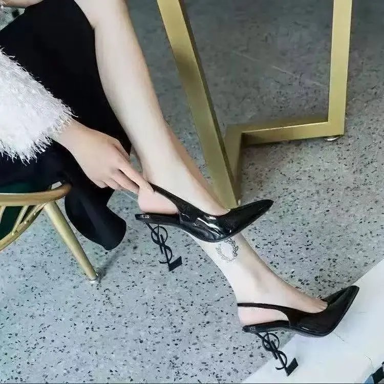 Saint Laurent YSL monogram heel footwear — Black sandals, 10cm