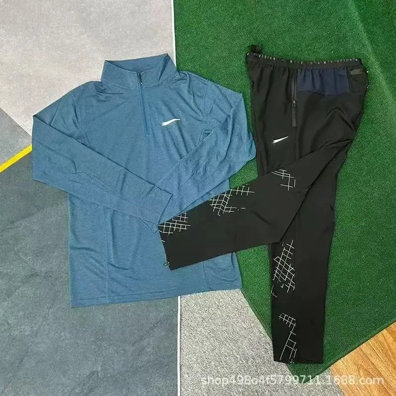 Nike Jackets Running Division hooded windbreaker jacket — 04
