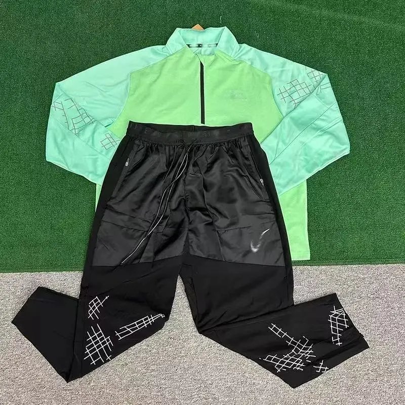 Nike Jackets Running Division hooded windbreaker jacket — 09