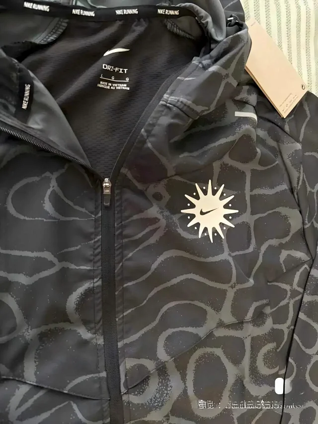 Nike Tracksuits Hooded zip-up patterned tracksuit product detail image 9