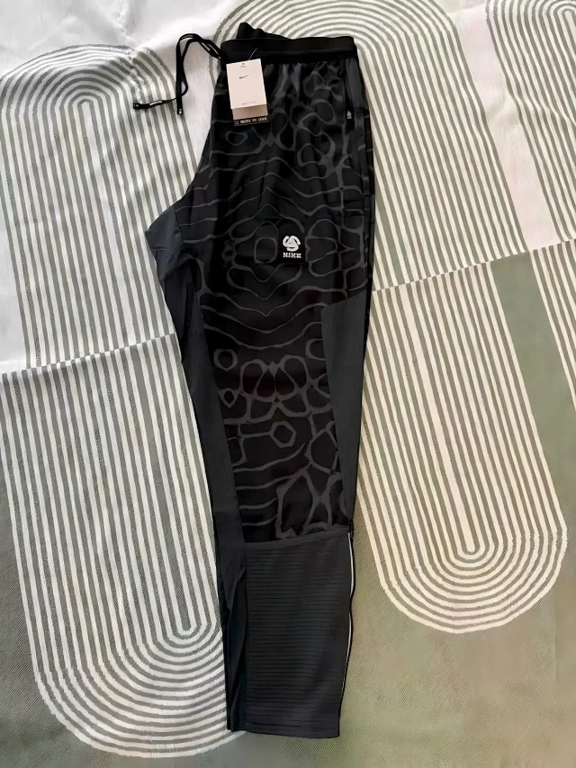 Nike Tracksuits Hooded zip-up patterned tracksuit product detail image 11