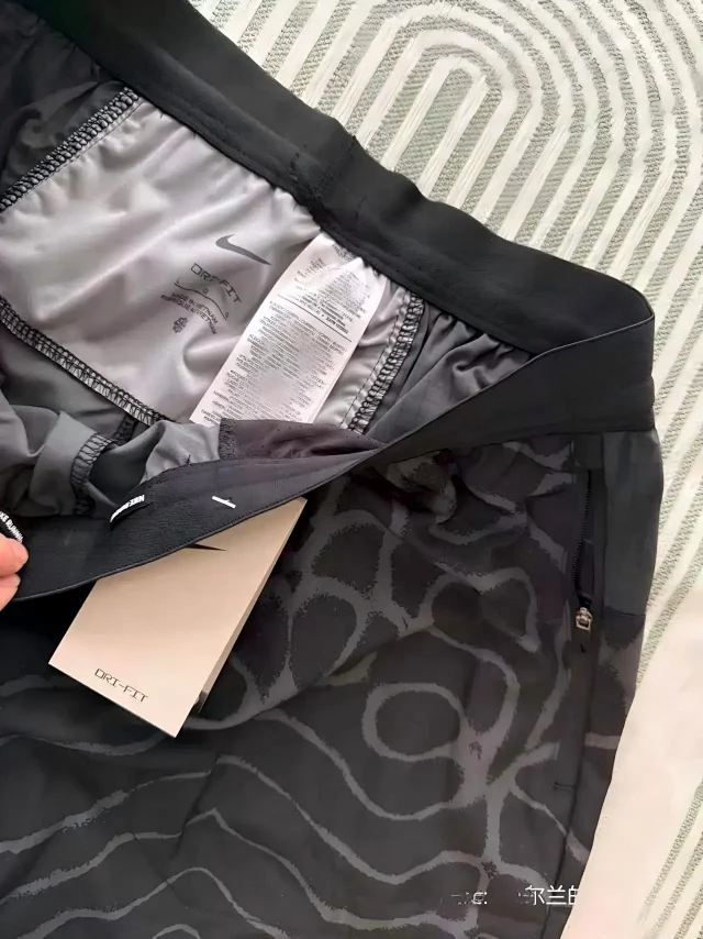 Nike Tracksuits Hooded zip-up patterned tracksuit product detail image 13