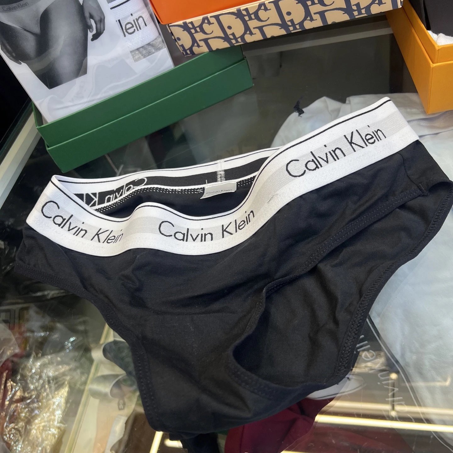 3 pairs of black triangular underwear