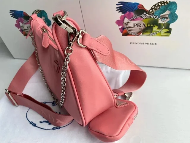 Prada Crossbody Bags Re-Edition 2000 nylon bag with detachable pouch, chain strap, and adjustable webbing strap product detail image 7