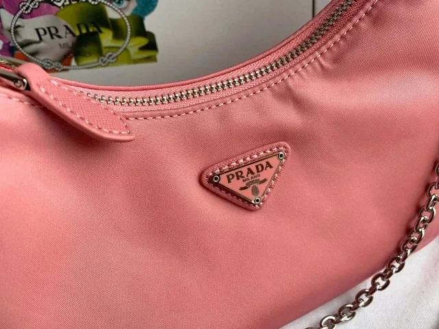 Prada Crossbody Bags Re-Edition 2000 nylon bag with detachable pouch, chain strap, and adjustable webbing strap product detail image 8