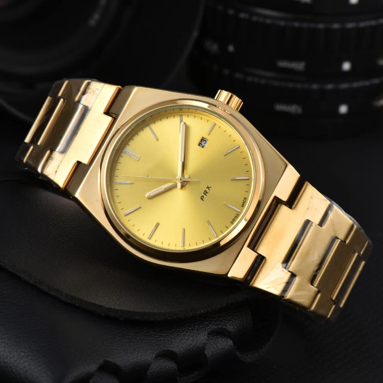 Tissot Watches PRX — Mechanical model – gold dial with a gold steel bracelet