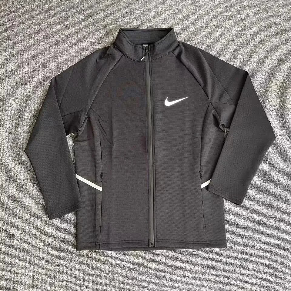 Nike Jackets Hooded zip-up windbreaker — Zip-up top 01