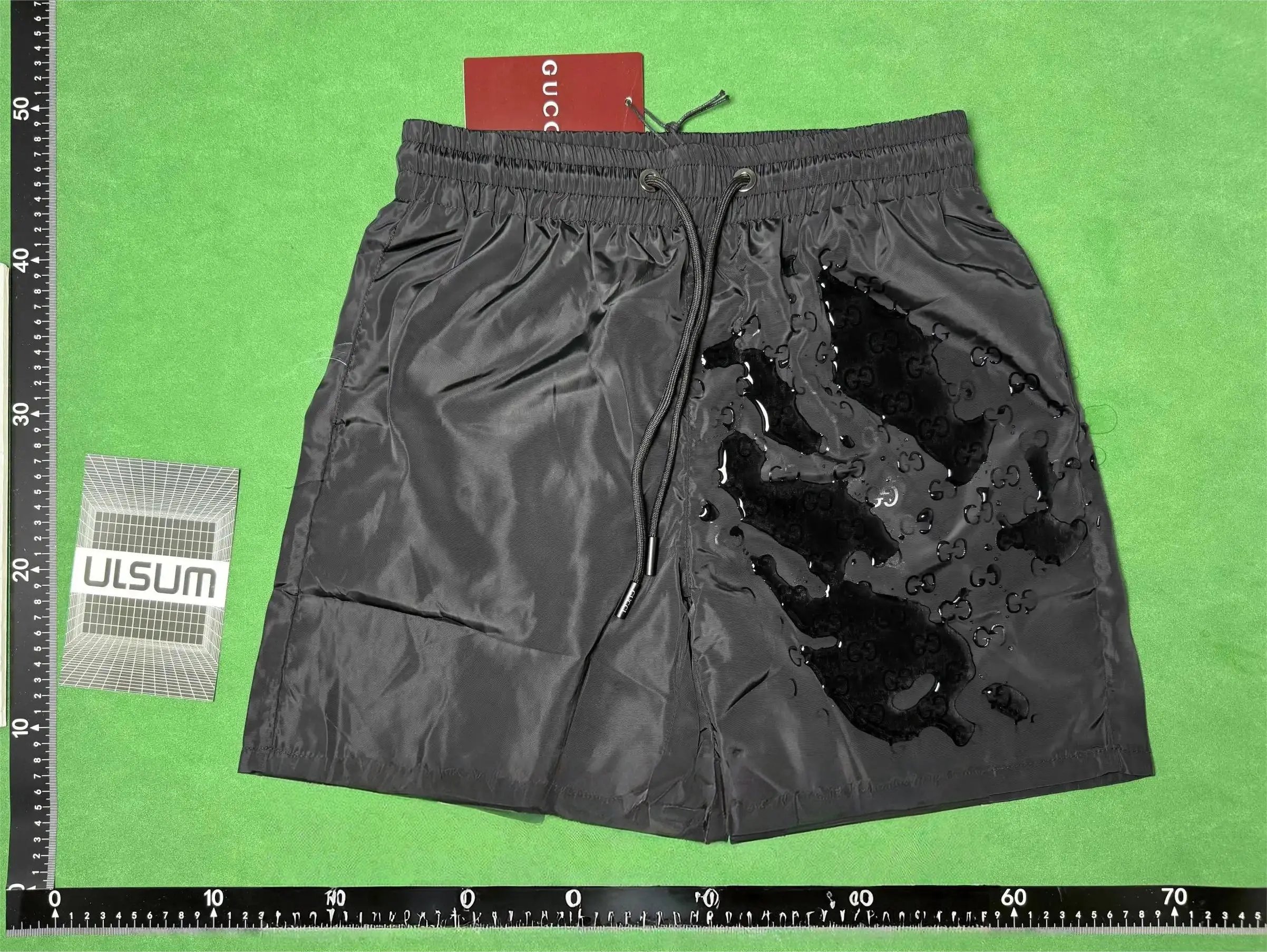 GUCCI logo appears when exposed to water