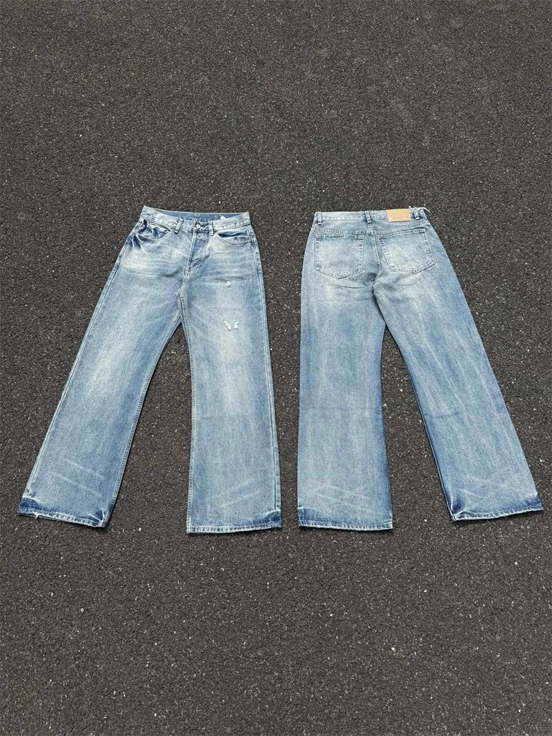 Design Wide-Leg Distressed Light Wash Jeans