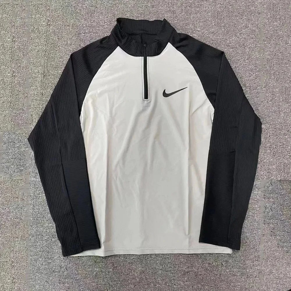 Nike Tracksuits Quarter-Zip Training Top and Zip-Hem Trousers Set — Threaded lining 05