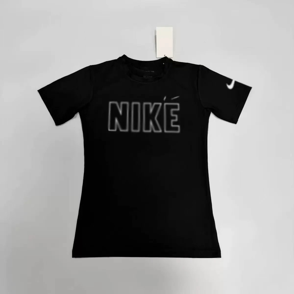Nike T-Shirts Performance training T-shirt with contrast flatlock seams and oversized Swoosh — 11