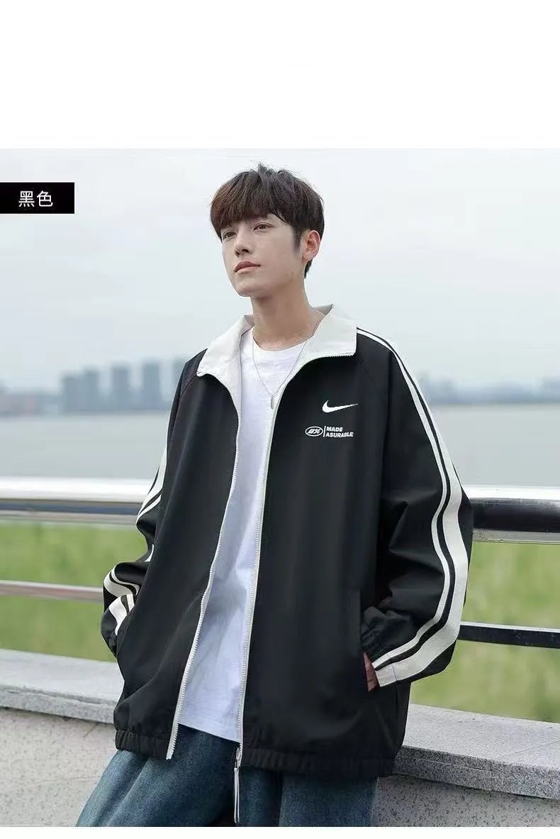 Nike Jackets Varsity-style snap-front jacket with contrast striped sleeves and patches — 19