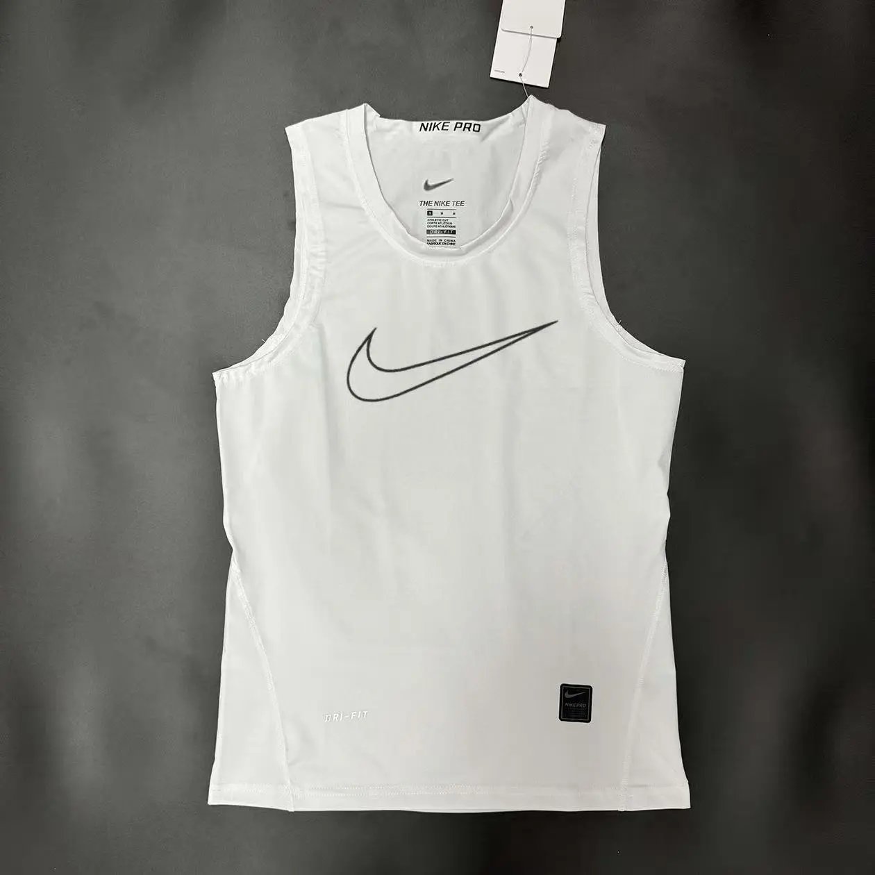 Nike T-Shirts Performance training T-shirt with contrast flatlock seams and oversized Swoosh — 18.