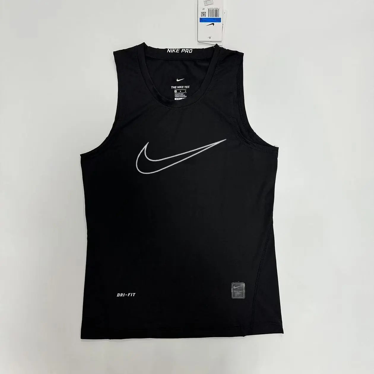 Nike T-Shirts Performance training T-shirt with contrast flatlock seams and oversized Swoosh — 17.