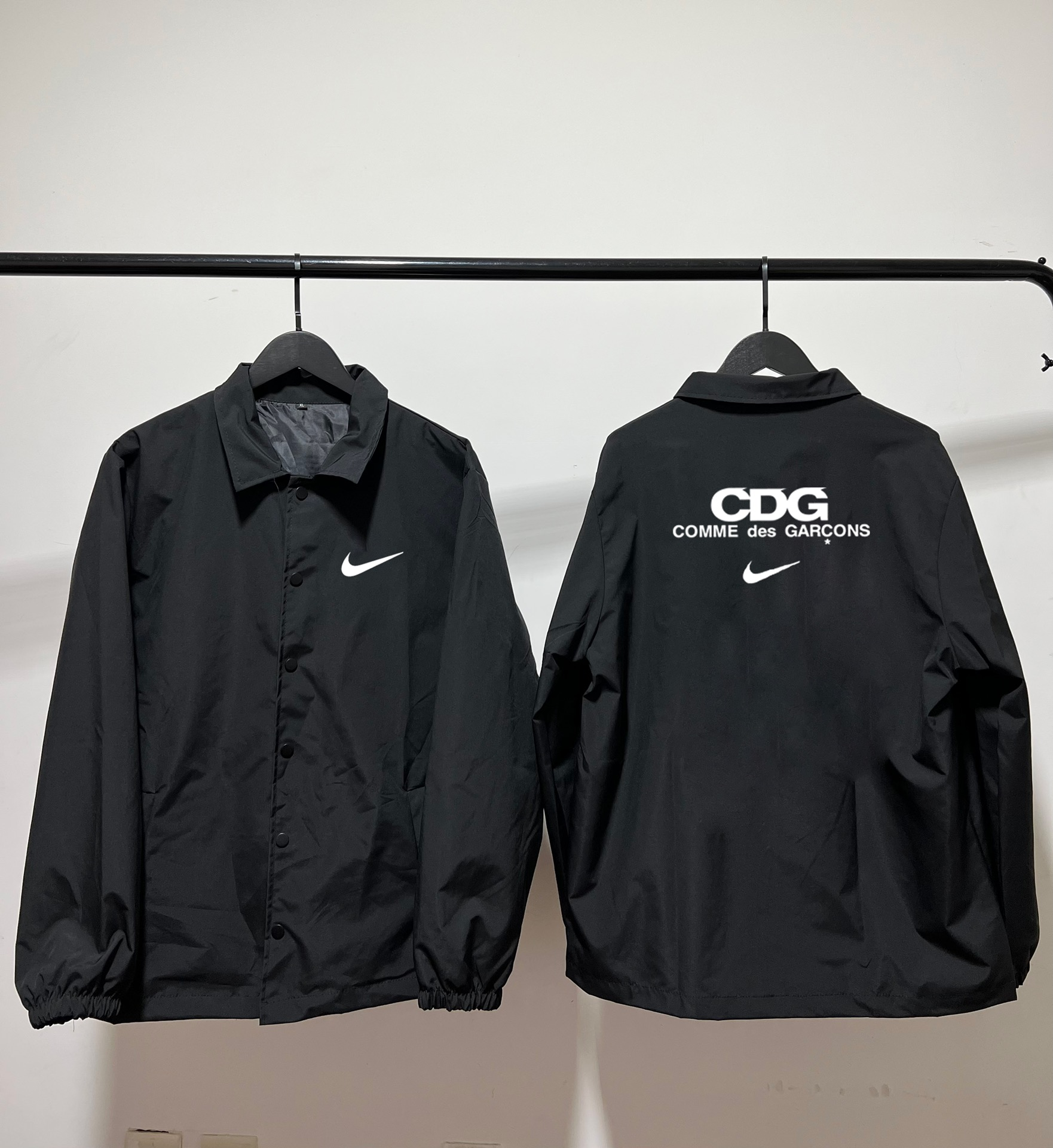 Nike Jackets Varsity-style snap-front jacket with contrast striped sleeves and patches image 8