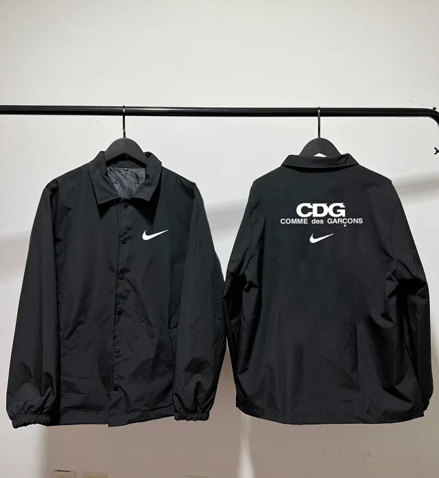 Nike Jackets Varsity-style snap-front jacket with contrast striped sleeves and patches product detail image 8