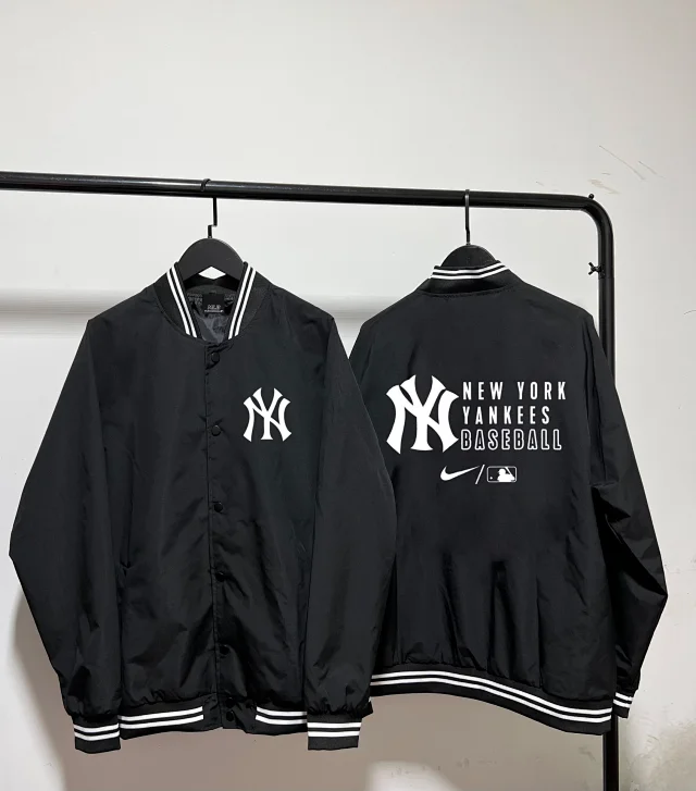 Nike Jackets Varsity-style snap-front jacket with contrast striped sleeves and patches product detail image 9