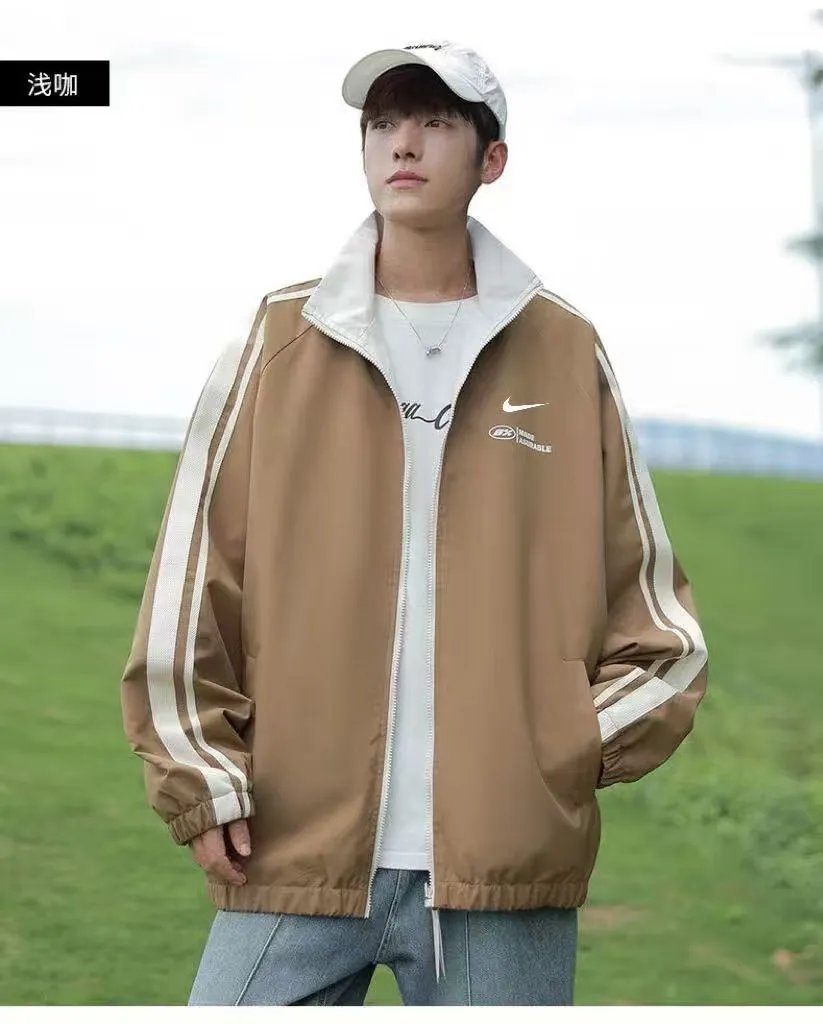 Nike Jackets Varsity-style snap-front jacket with contrast striped sleeves and patches — 20