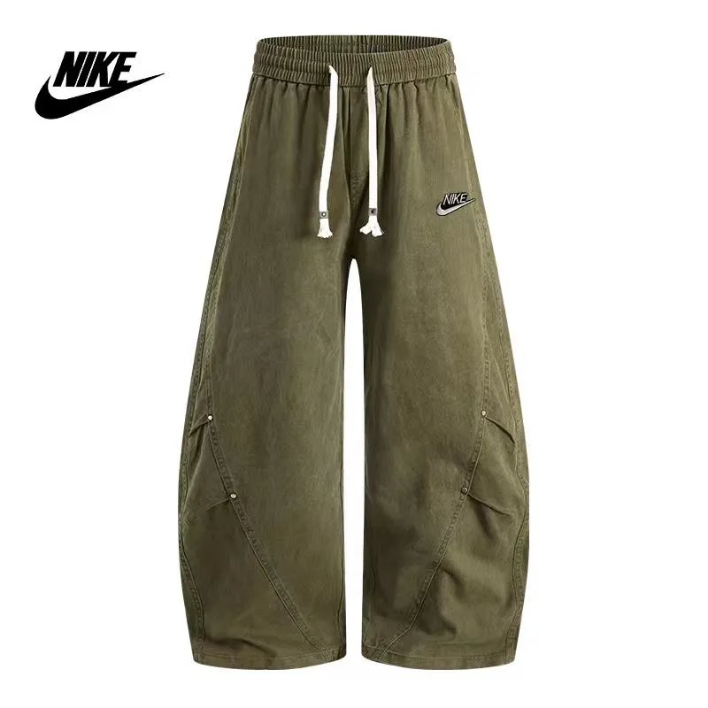 Nike Jackets Varsity-style snap-front jacket with contrast striped sleeves and patches — 23