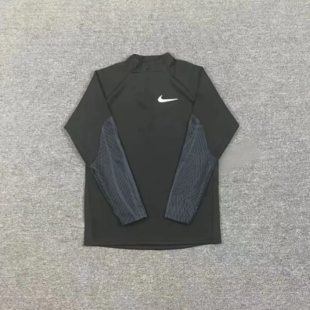 Black half zip long sleeved shirt