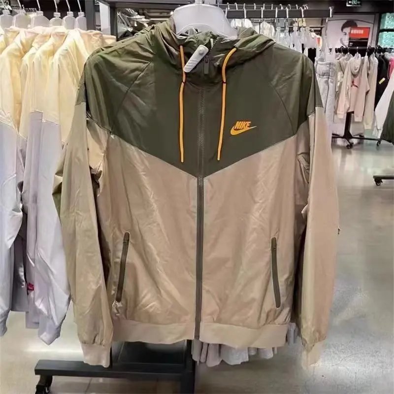 Nike Down Jackets Hooded quilted zip-up puffer jacket — 15