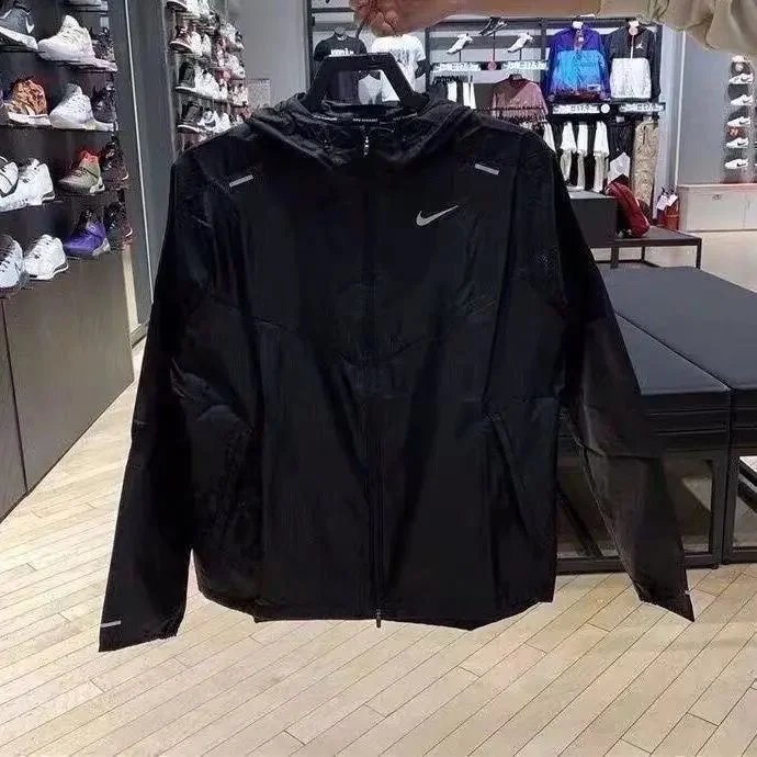 Nike Down Jackets Hooded quilted zip-up puffer jacket — 06