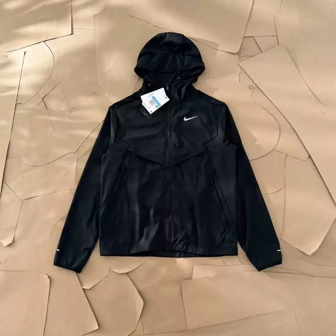 Nike Down Jackets Hooded quilted zip-up puffer jacket — 10