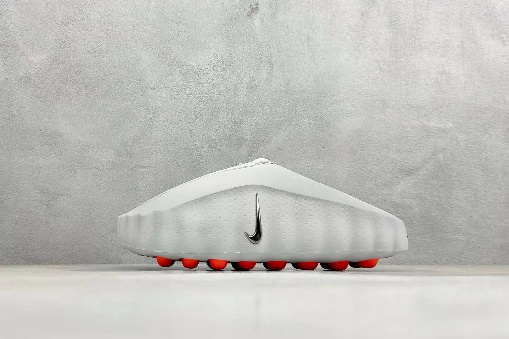 Nike Slippers One-piece slide with embossed Swoosh — 39