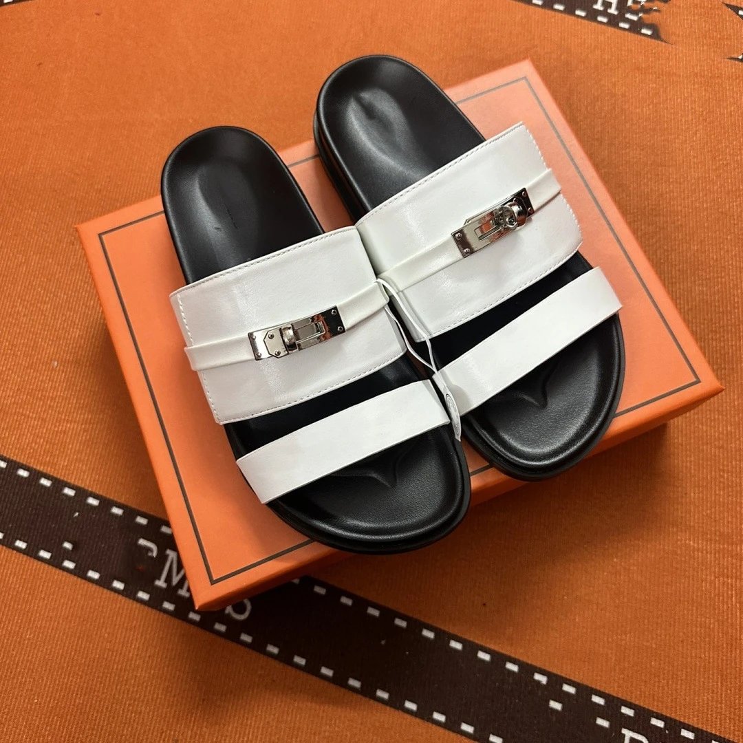 Hermès Sandals Two-strap flat with Kelly buckle — white